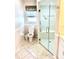 Bathroom with toilet and walk-in shower at 6 Pinehurst Rd, Rotonda West, FL 33947