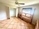 Bedroom with wood flooring and a ceiling fan at 6 Pinehurst Rd, Rotonda West, FL 33947