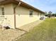 Well-maintained exterior with gravel landscaping at 6 Pinehurst Rd, Rotonda West, FL 33947