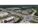Aerial view of roadway and businesses including McDonald's and Publix at 6232 Drucker Cir, Port Charlotte, FL 33981