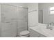 Bathroom features a shower, toilet, vanity, and tiled floors at 6232 Drucker Cir, Port Charlotte, FL 33981