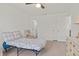 Cozy bedroom with tiled floors, ample closet space, and ensuite bathroom at 6232 Drucker Cir, Port Charlotte, FL 33981