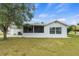 Newly renovated home with screened patio and large backyard at 6232 Drucker Cir, Port Charlotte, FL 33981