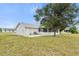Newly remodeled home with a large backyard and screened patio at 6232 Drucker Cir, Port Charlotte, FL 33981