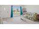 Living room with floral sofa and tiled floors at 6232 Drucker Cir, Port Charlotte, FL 33981
