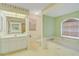 Bathroom features a bathtub, toilet, and updated vanity at 740 Citrus Rd, Venice, FL 34293