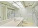 Clean bathroom with shower, toilet, and updated vanity at 740 Citrus Rd, Venice, FL 34293