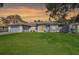 Front exterior of house with garage and landscaping at 740 Citrus Rd, Venice, FL 34293