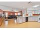 Open kitchen with island and views of living room at 740 Citrus Rd, Venice, FL 34293