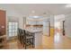 Kitchen with breakfast bar, white cabinets, and stainless steel appliances at 740 Citrus Rd, Venice, FL 34293