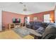 Living room boasts a comfortable sectional sofa and flat-screen TV at 740 Citrus Rd, Venice, FL 34293