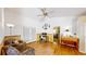 Home office with hardwood floors, built-in desk, and access to backyard at 740 Citrus Rd, Venice, FL 34293