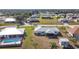 Aerial view showing home, pool, and neighborhood context at 7407 Castleberry Ter, Englewood, FL 34224