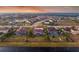 Community overview showcasing luxurious homes with pools and lush landscaping at 7484 Ripetta St, Sarasota, FL 34240