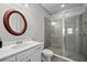 Bathroom features a large walk-in shower and modern vanity at 7484 Ripetta St, Sarasota, FL 34240