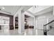 Open and inviting entryway leading to dining area and kitchen at 7484 Ripetta St, Sarasota, FL 34240