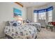 Guest bedroom with twin beds and seashell bedding at 804 Triano Cir # 804, Venice, FL 34292