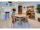 Bright dining room features a charming table and chairs at 804 Triano Cir # 804, Venice, FL 34292