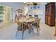 View of the dining area with a round table and four chairs at 804 Triano Cir # 804, Venice, FL 34292