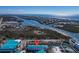 Aerial view of waterfront property with boat slips at 8230 Harborside Cir, Englewood, FL 34224