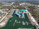 Wide aerial view of waterfront property and marina at 8230 Harborside Cir, Englewood, FL 34224