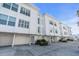 Modern white building exterior, waterfront property at 8230 Harborside Cir, Englewood, FL 34224