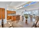 Bright kitchen with wood cabinets, island, and view at 8230 Harborside Cir, Englewood, FL 34224