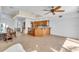 Open concept kitchen with wood cabinets and island at 8230 Harborside Cir, Englewood, FL 34224