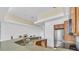 Modern kitchen with stainless steel appliances and island at 8230 Harborside Cir, Englewood, FL 34224