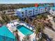 Aerial view showing community pool, hot tub, and building at 8230 Harborside Cir, Englewood, FL 34224
