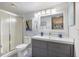 Bright bathroom with a modern vanity, walk-in shower, and stylish decor, creating a serene and inviting atmosphere at 854 Bird Bay Way # 190, Venice, FL 34285