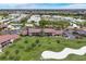 Aerial view of condo building near the golf course at 927 Capri Isles Blvd # 7, Venice, FL 34292