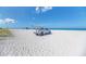 Scenic beach view with white sand and ocean at 927 Capri Isles Blvd # 7, Venice, FL 34292