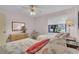 Guest bedroom with twin beds and seashell bedding at 927 Capri Isles Blvd # 7, Venice, FL 34292