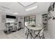 Bright and airy community room with plenty of tables at 927 Capri Isles Blvd # 7, Venice, FL 34292