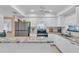 Modern kitchen with granite countertops and stainless steel appliances at 927 Capri Isles Blvd # 7, Venice, FL 34292