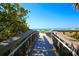 Wooden boardwalk provides easy beach access at 1000 Tarpon Center Dr # 601, Venice, FL 34285