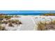 Seashell path leading to pristine beach at 1000 Tarpon Center Dr # 601, Venice, FL 34285