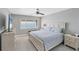 Main bedroom with ocean view and ceiling fan at 1000 Tarpon Center Dr # 601, Venice, FL 34285