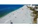 Sandy beach with blue waters perfect for relaxation and recreation, near beachfront condos at 1023 Hope St, Venice, FL 34285