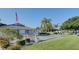 Relaxing view of the community shuffleboard courts at 1041 Capri Isles Blvd # 119, Venice, FL 34292