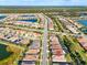 Aerial view of Renaissance Wellen Park community featuring beautiful homes, lakes and lush landscaping at 11903 Alessandro Ln, Venice, FL 34293