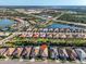 Overhead view of a well-planned residential area near lakes and highways, showcasing the community's convenient location at 11903 Alessandro Ln, Venice, FL 34293