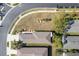 Aerial view of a community showcasing home sites and landscaping at 11915 Tempest Harbor Loop, Venice, FL 34292