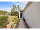 Well-maintained front yard with walkway and decorative rock landscaping at 11915 Tempest Harbor Loop, Venice, FL 34292