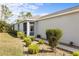 Nice side yard with decorative landscaping and walkway at 11915 Tempest Harbor Loop, Venice, FL 34292