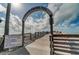 The archway entrance to the Venice Fishing Pier featuring a welcome sign and pier rules at 1212 Mango Ave, Venice, FL 34285