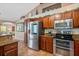 Kitchen featuring stainless steel appliances and granite countertops at 1232 Marilyn Ln, North Port, FL 34286