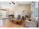 Cozy living room with comfortable seating, neutral tones, and an abundance of natural light at 1232 Marilyn Ln, North Port, FL 34286