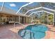 Beautiful pool with screened lanai and brick patio at 1232 Marilyn Ln, North Port, FL 34286